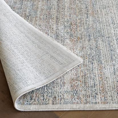Faded Traditional Patterned Carpet